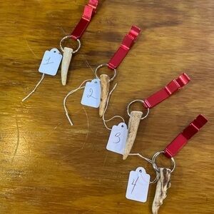 Handmade antler key chain with bottle opener.